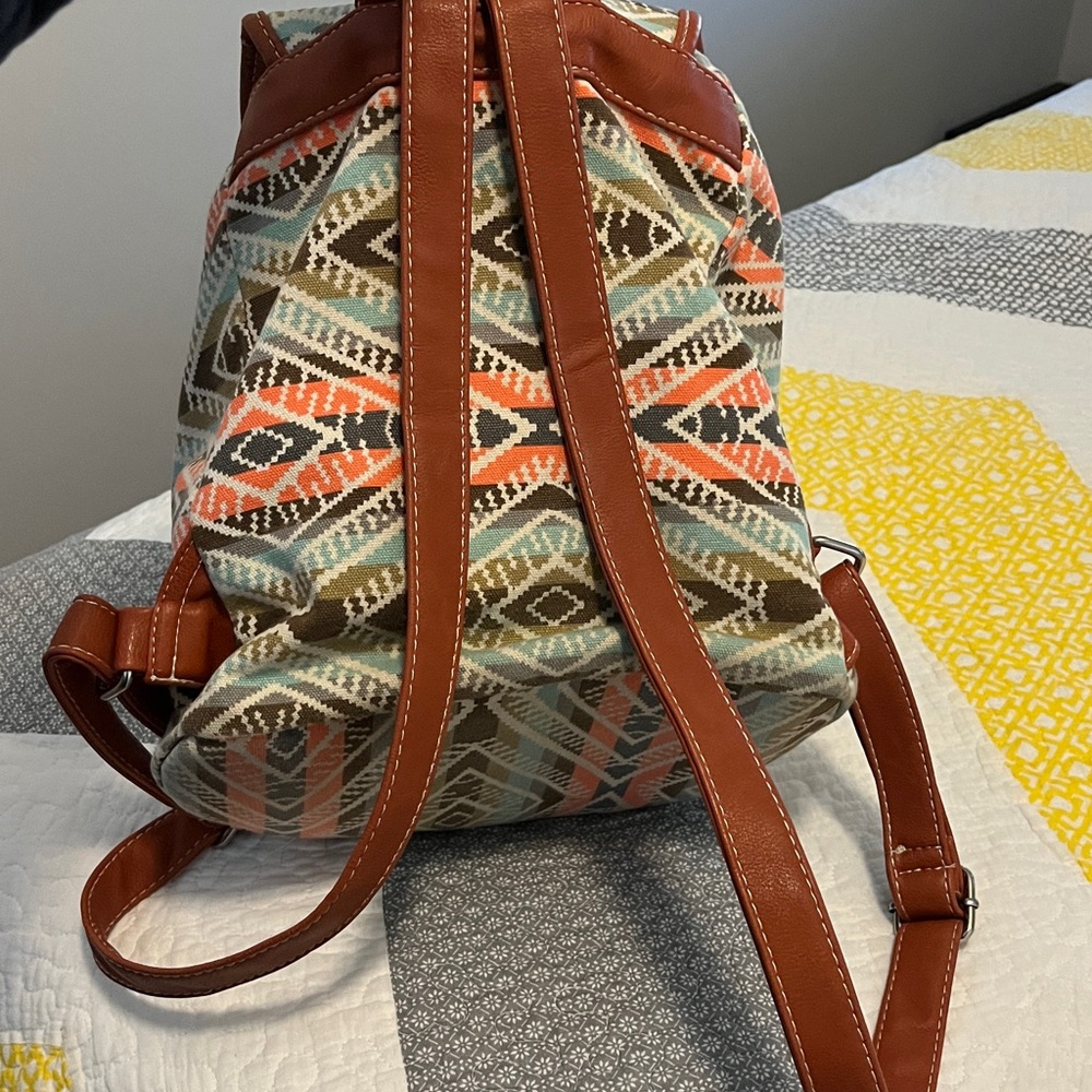 Patterned Backpack With Brown Accents - image 6